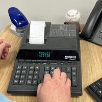 Monroe ClassicX 12-Digit Heavy-Duty Printing Calculator (In Use)