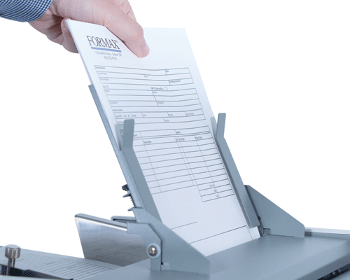 Dedicated multi-sheet feeder folds up to 4 stapled or unstapled sheets