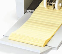This paper folder has an extended exit tray that ensures the neat stacking of finished folded papers.