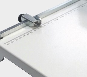 Side guide with skew adjustment for ease of use.